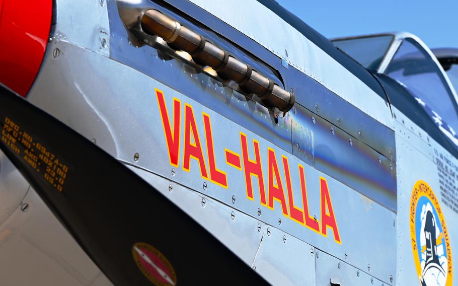 Val-Halla is written on the side of a P-51.