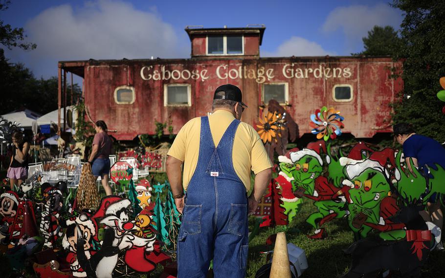 Yard art is displayed for sale during the U.S. 127 Yard Sale on Aug. 2 in Crossville, Tenn. 