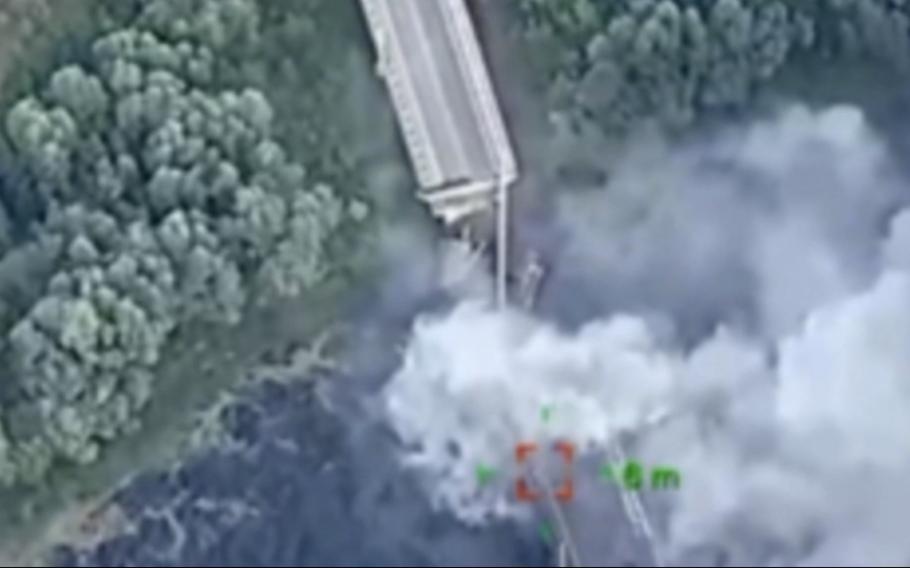 In this photo provided by the Ukrainian Defence Ministry Press Office, a strategically important bridge over the river Seym is destroyed by Ukrainian troops as they continue their incursion into the Kursk region, Russia, Friday, Aug. 16, 2024. The bridge was used by the Kremlin to supply its troops and its destruction could hamper their efforts.