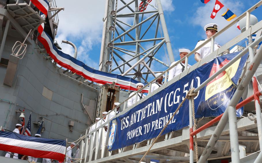 The Ticonderoga-class guided-missile cruiser USS Antietam is decommissioned.