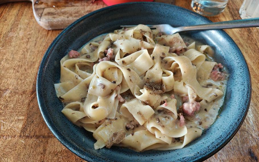 The truffle and Italian sausage pasta at Limoncello in Cambridge, England, is topped with bits of fresh truffle. The pappardelle noodles and Italian sausage that make up the dish are served in a bechamel sauce, which contains truffle oil. 