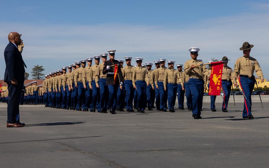 New U.S. Marines march in formation.