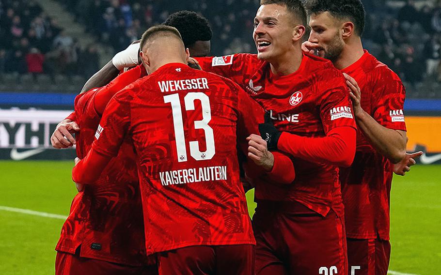 1. FC Kaiserslautern players celebrate in Berlin.