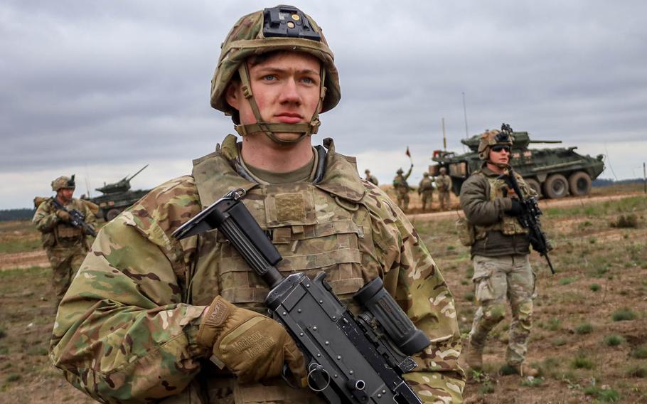 U.S. Army Pfc. Nathan Guynn maneuvers with his squad during exercise Saber Strike at Pabrade Training Area in Lithuania on April 21, 2024. With an influx of NATO troops and the expansion of Lithuania's military, some small-town residents could be forced to relocate as the country seeks additional training space, a Lithuanian official said July 23, 2024.