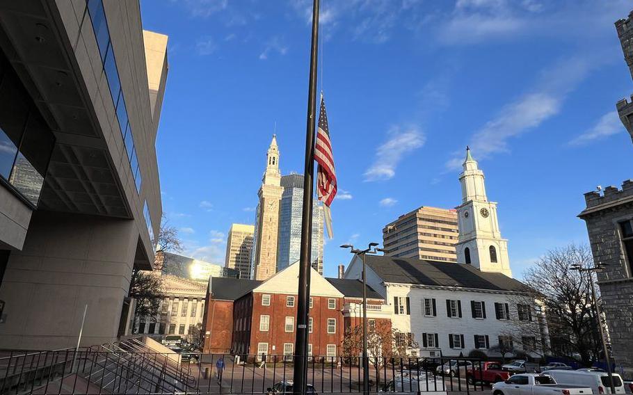 An American flag flies at half-staff in front of Springfield District Court in Springfield, Mass., on Dec. 19, 2023. A Holyoke, Mass., sailor who served on the USS California at Pearl Harbor will be buried Jan. 27, 2024, with flags across the state ordered to be raised to half-staff, Gov. Maura Healey announced.