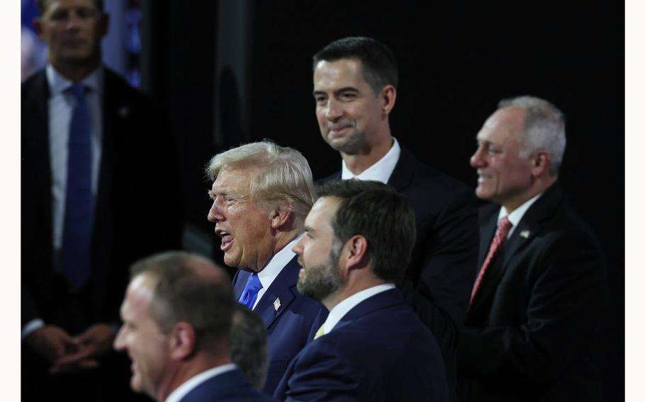 Republican Presidential nominee Donald Trump reacts from the stands as he attends day two of the Republican National Convention in Milwaukee, Wis., on Tuesday, July 16, 2024, days after surviving an assassination attempt.