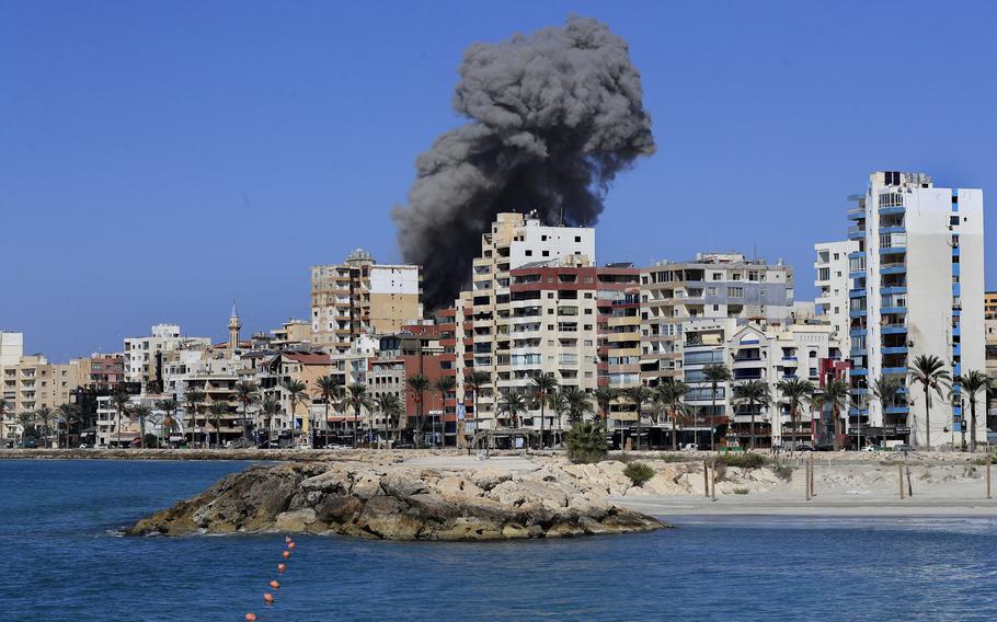 Smoke rises from buildings hit in an Israeli airstrike in Tyre, Lebanon, Oct. 23, 2024.