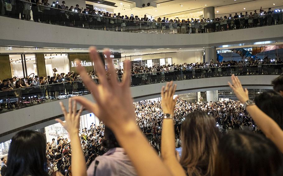 Demonstrators sing the “Glory To Be Thee, Hong Kong” protest song during a flash mob in 2019. 