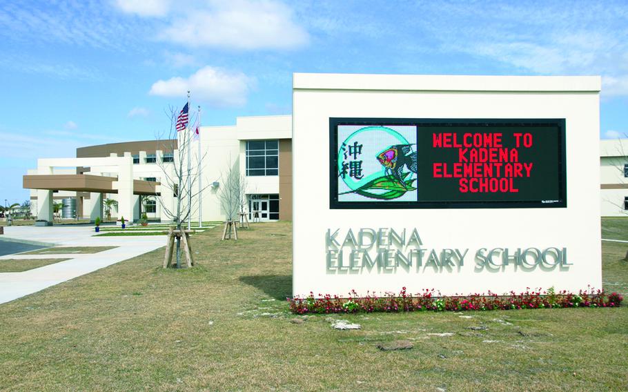 A sign outside a school on Okinawa says, “Welcome to Kadena Elementary School.”