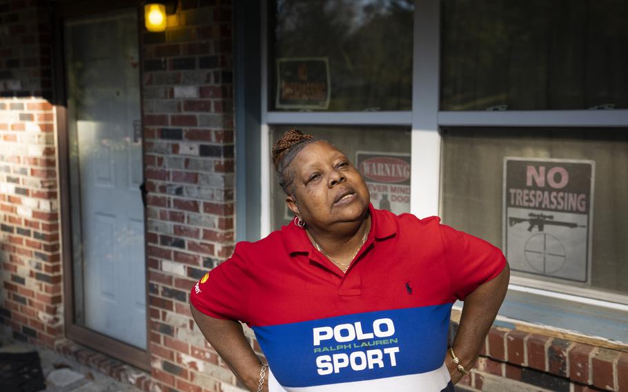 Georgia voter Cynthia Jones speaks in front of her home where she and her disabled sister live, Thursday, Nov. 3, 2022, in Atlanta. The Atlanta native sees a country split between haves and have nots. 