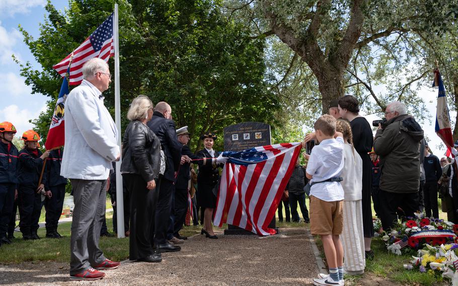 A memorial for a U.S. B-17 bomber crew is unveiled in Épagne-Épagnette, France, Saturday, June 22, 2024, near the site where the plane crashed during World War II. 
