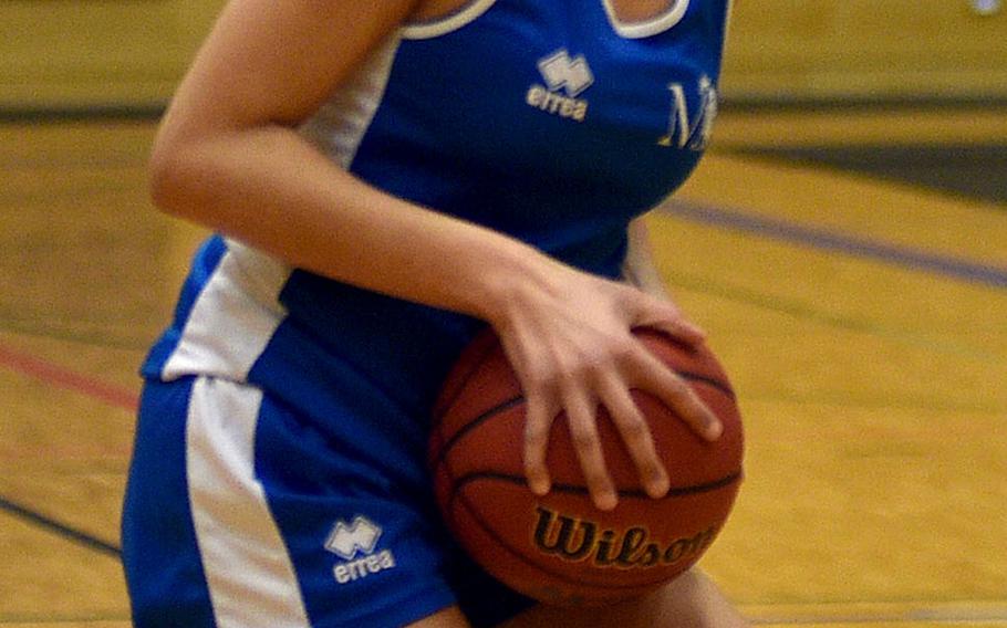 Abyssinia Thompson grabs a rebound.