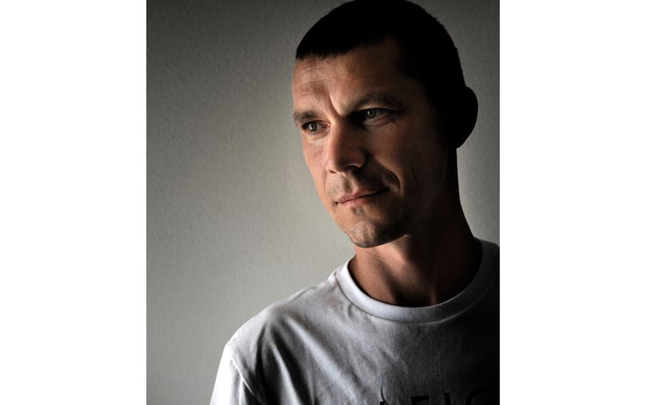 Ilia Mykhalchuk, a Ukrainian soldier who lost both arms as a Wagner prisoner of war, photographed in Silver Spring, Md.