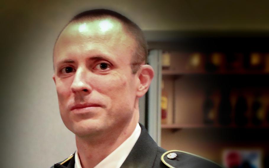 Master Sgt. Justin Sweat poses in uniform.