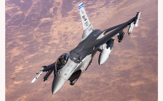 A U.S. Air Force F-16 Fighting Falcon aircraft, assigned to the 121st Expeditionary Fighter Squadron, flies over U.S. Central Command’s area of responsibility during a mission in support of Combined Joint Task Force-Operation Inherent Resolve, July 17, 2021. CJTF-OIR enables its partners to ensure the enduring defeat of ISIS in designated areas of Iraq and Syria and sets conditions for follow-on operations to increase regional stability. (U.S. Air Force photo by Senior Airman Taylor Crul)