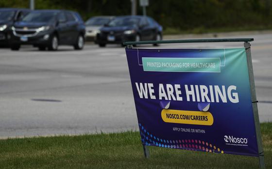 FILE - A hiring sign is seen in Waukegan, Ill., on Sept. 28, 2024. (AP Photo/Nam Y. Huh, File)