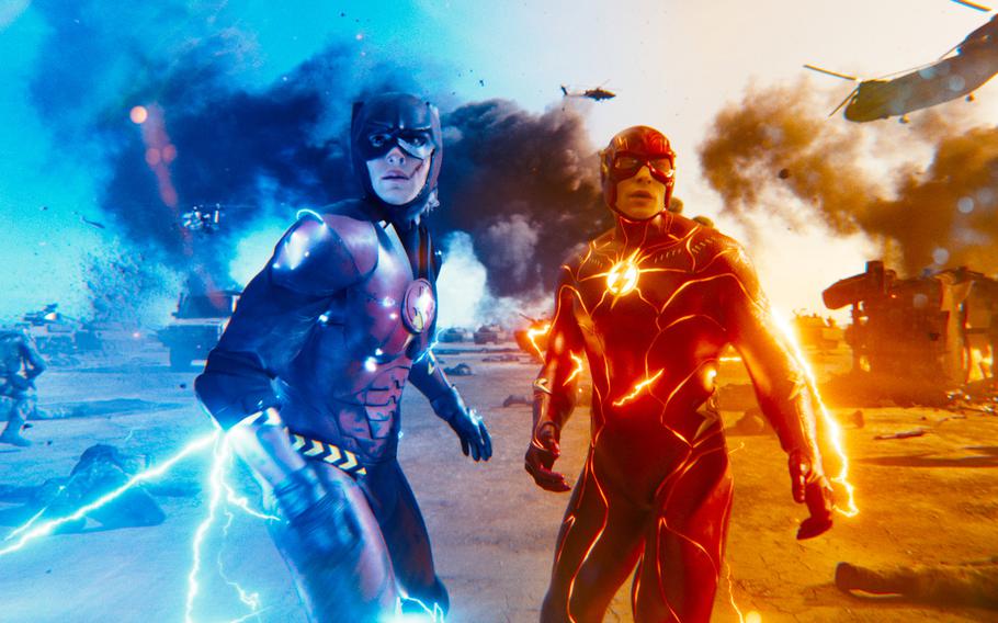 Two versions of The Flash (Ezra Miller) join a battle for Earth in “The Flash.”