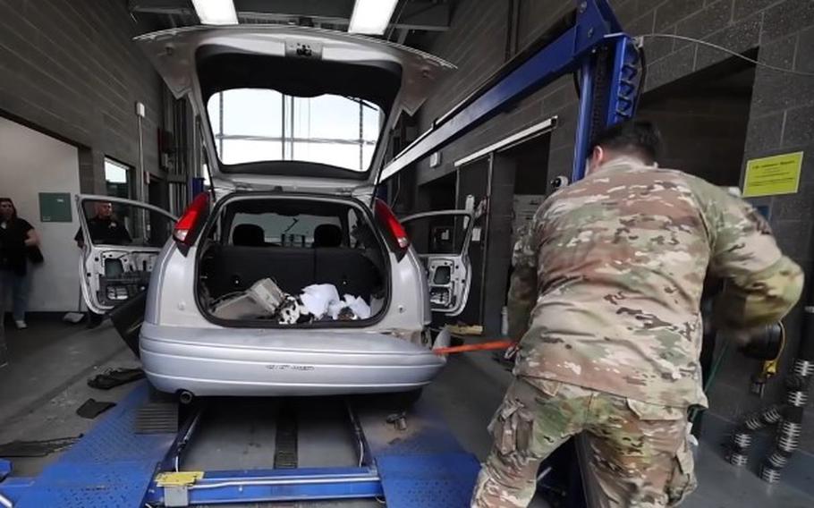 A California National Guard member checks a vehicle for drugs as part of the Guard’s Counter Drug Taskforce. 