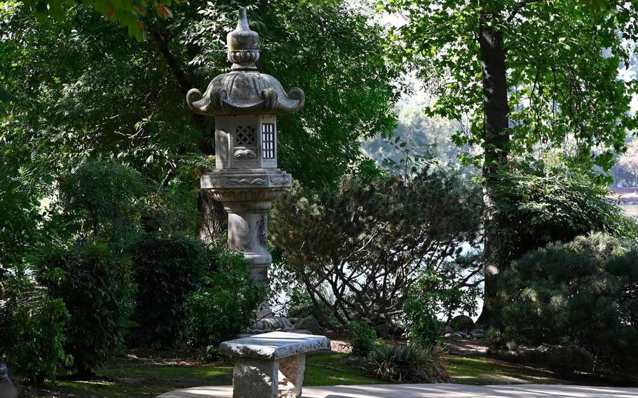 A stone lantern is seen along a pathway inside Shinzen Friendship Garden in Woodward Park on Sept. 4, in Fresno, Calif.