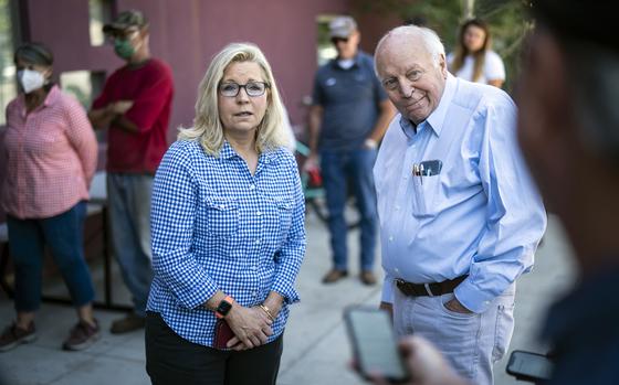 FILE - Rep. Liz Cheney, R-Wyo., arrives, with her father, former Vice President Dick Cheney, to vote at the Teton County Library during the Republican primary election Aug. 16, 2022, in Jackson Hole, Wyo. (Jabin Botsford/The Washington Post via AP, File)