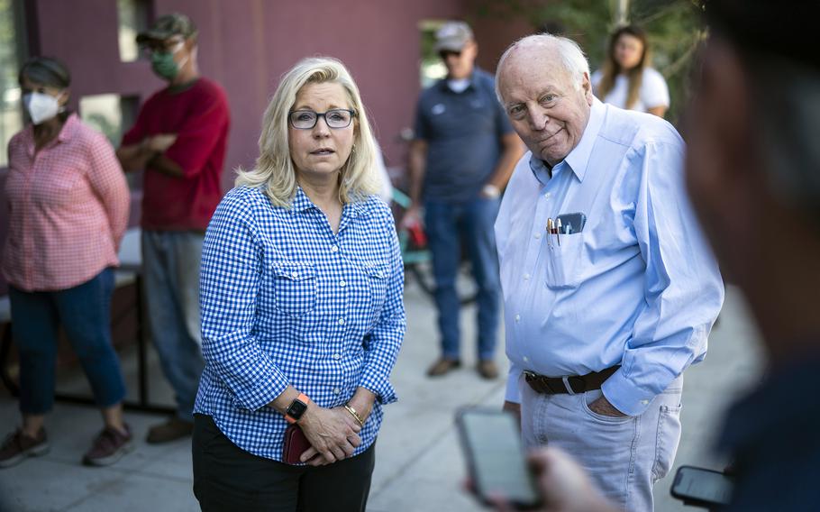 Rep. Liz Cheney, R-Wyo., arrives, with her father, former Vice President Dick Cheney, to vote at the Teton County Library during the Republican primary election Aug. 16, 2022, in Jackson Hole, Wyo. 