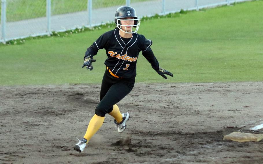 Julia Petruff passes third base.