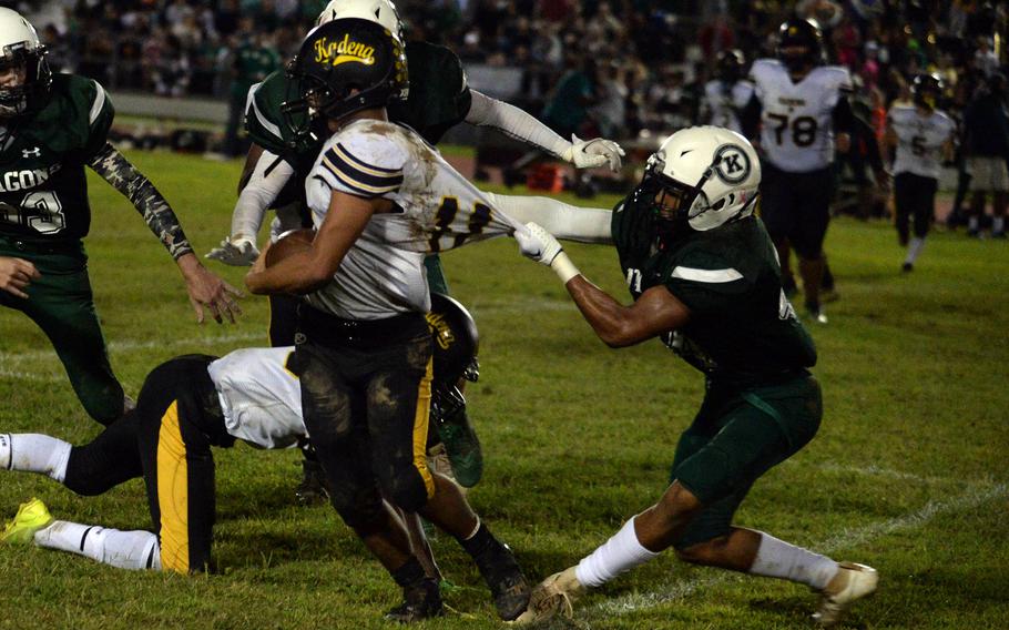 Tre Johnson grabs a jersey.