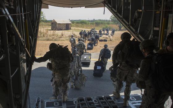 U.S. Army soldiers with Combined Joint Task Force-Horn of Africa's East Africa Response Force (EARF) depart an U.S. Air Force C-130 Hercules from Camp Lemonnier, Djibouti, Dec. 18, 2013. The EARF deployed to South Sudan supporting the ordered departure of the U.S. Embassy. The EARF is part of a new Defense Department initiative of regionally aligned forces, which provides the commander of U.S. Africa Command an additional capability to respond to crises and contingencies within East Africa. (U.S. Air Force photo by Tech. Sgt. Micah Theurich)