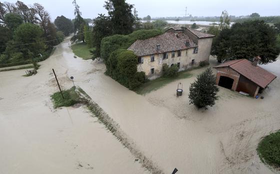 The Lamone river overflows its banks near Bagnacavallo, in the region of Emilia-Romagna, Italy, Thursday, Sept. 19, 2024. (Fabrizio Zani/LaPresse via AP)