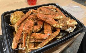 Snow crab legs, shrimp, green mussels and potatoes, from Delmar Boiling Crab in Pyeongtaek, South Korea, May 17, 2024.