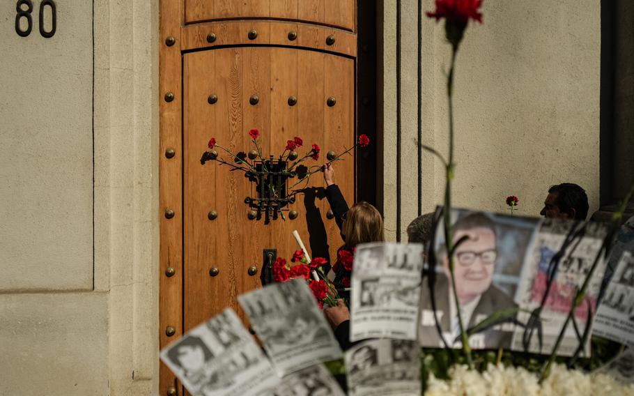 Red carnations are placed at the eastern entrance of La Moneda presidential palace on the anniversary of the 1973 military coup and President Salvador Allende’s subsequent death in Santiago, Chile.