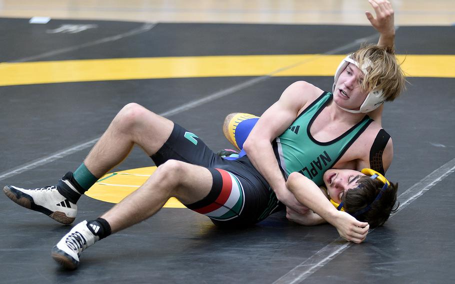 Brady Price pins Phillip Garcia.