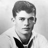 A black-and-white, World War II-era portrait of a Navy sailor in uniform.