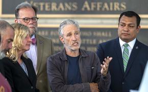 Jon Stewart speaks outside the Department of Veterans Affairs in Washington following meetings with officials on July 26, 2024.