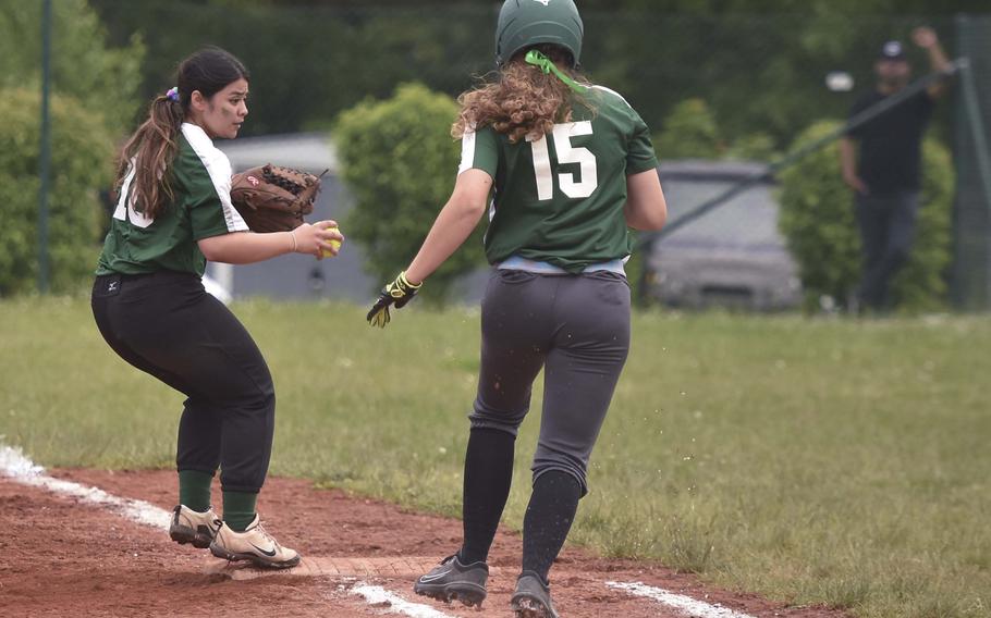 Alconbury junior Kalila Te'o forces an out at first base against Naples junior Anna Gose during day one of the European championships on May 22, 2024, at Ramstein Air Base, Germany.