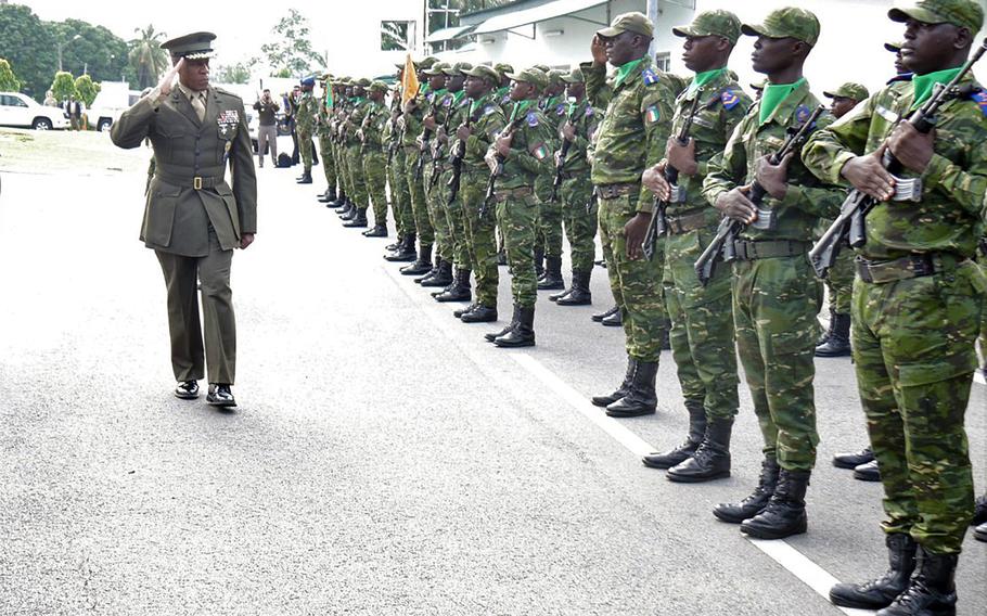 Marine Corps Gen. Michael E. Langley, head of U.S. Africa Command, salutes an Ivory Coast honor guard during a visit to Abidjan April 24, 2024. Ivory Coast is among the countries the U.S. is looking at working with more closely in light of recent coups and mounting terror threats in West Africa.