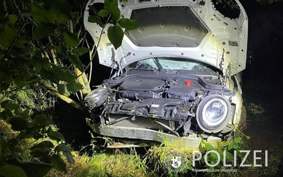 A Mini Cooper was left inoperable after a crash on a traffic circle near Mackenbach, Germany, early Friday. The driver suffered minor injuries and was transported to a hospital.