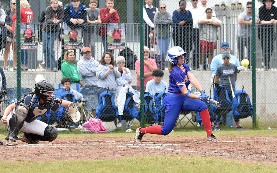 Ramstein senior Jazmyn Hall swings at a pitch from Kaiserslautern's Bevanie Cleark during the Division I DODEA European softball championship game on May 24, 2024, at Kaiserslautern High School in Kaiserslautern, Germany.