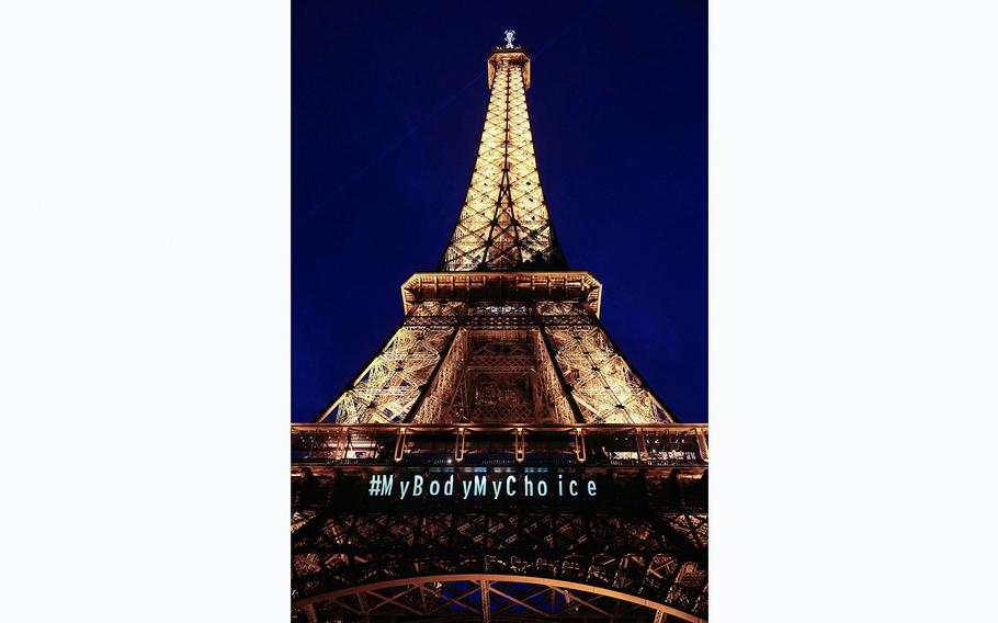 A message reading, “My body my choice,” is projected onto the Eiffel Tower in Paris on March 4, 2024, after the French parliament voted to anchor the right to abortion in the country’s constitution.