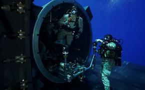 U.S. Marines from the 2nd Force Reconnaissance Company, assigned to Task Force 61/2, conduct dive training out of the dry deck shelter of Ohio-class guided-missile submarine USS Georgia while underway in the Mediterranean Sea July 27, 2024. 