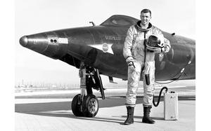 Captain Joe Engle is seen here next to the X-15-2 (56-6671) rocket-powered research aircraft after a flight.