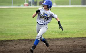 Yokota's Erica Haas darts around the bases for an in-park home run during Tuesday's Division II softball tournament. The Panthers won all four of their round-robin games to take the top seed entering Thursday's playoffs.