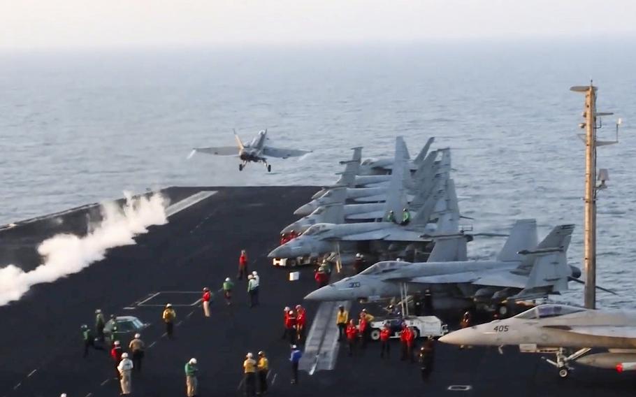  An aircraft launching from the USS Harry S. Truman