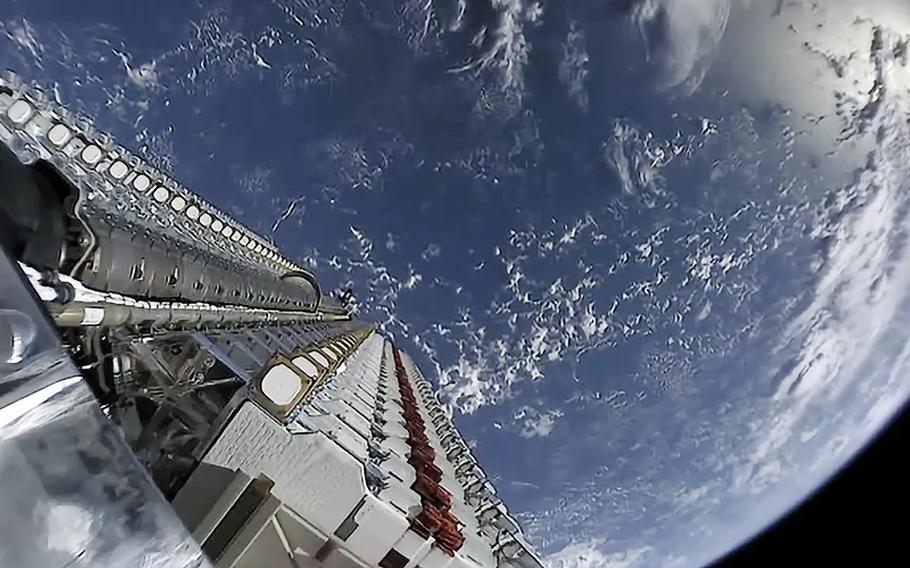 A batch of 60 Starlink test satellites stacked atop a Falcon 9 rocket.