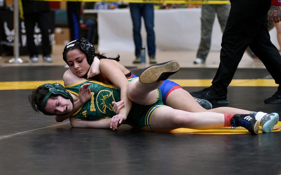 Genesis Esparza looks for a pin.