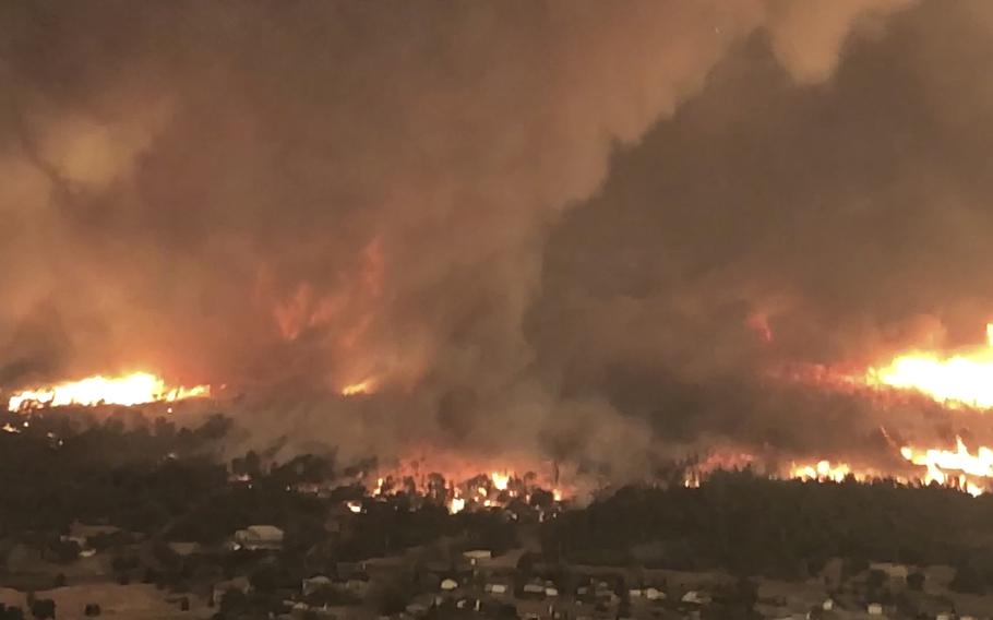 A fire tornado over Lake Keswick Estates