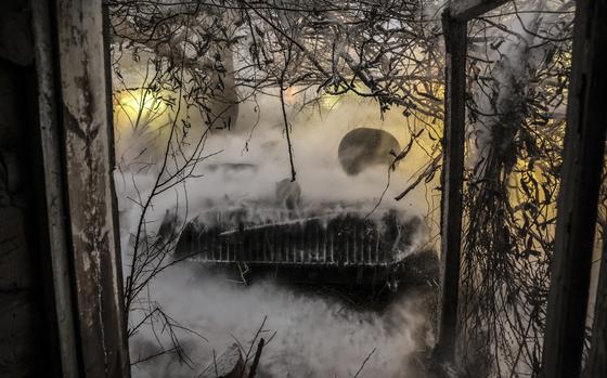 In this photo provided by Ukraine's 24th Mechanized Brigade press service, servicemen of the 24th Mechanised Brigade fire a 2s1 self-propelled 122mm howitzer towards Russian positions near Chasiv Yar town, in Donetsk region, Ukraine, Thursday, Dec. 12, 2024. (Oleg Petrasiuk/Ukrainian 24th Mechanised Brigade via AP)