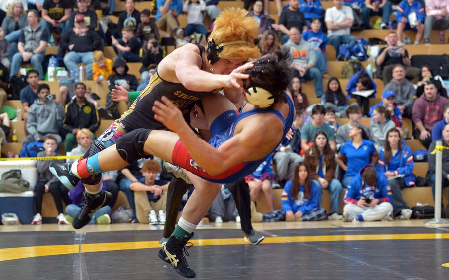 Kai Lewis takes down Isaac Martinez.