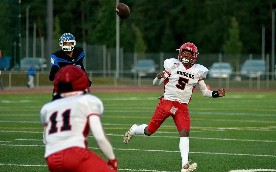 Kaiserslautern quarterback Rueben Todman throws a pass to receiver Andy Etchell during a Sept. 13, 2024, game against Ramstein at Ramstein High School on Ramstein Air Base, Germany.