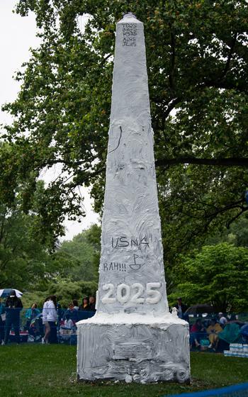 U.S. Naval Academy upperclassmen cover the Herndon monument in 200 pounds of vegetable shortening prior to the Herndon monument climb. The class of 2027 completed the climb in 2 hours, 19 minutes and 11 seconds.